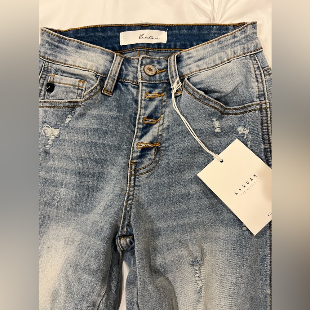 NWT. Kancan skinny jeans 1/24. Light wash. Distressed. with ankle slit